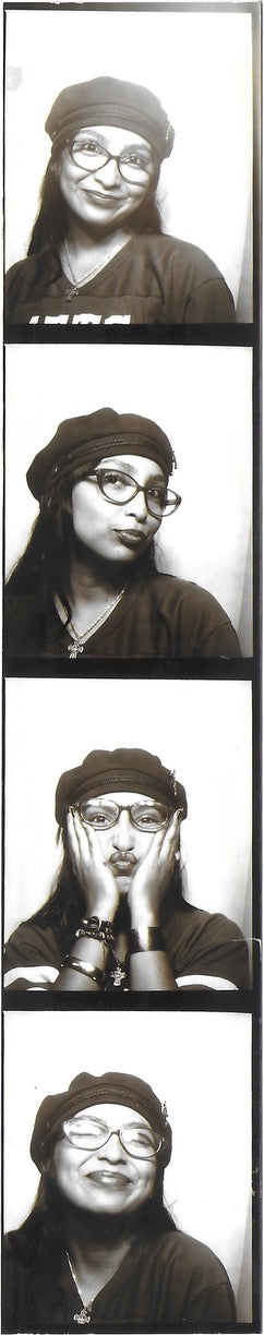 Black and white photo strip of a person wearing glasses and a hat with text overlay.